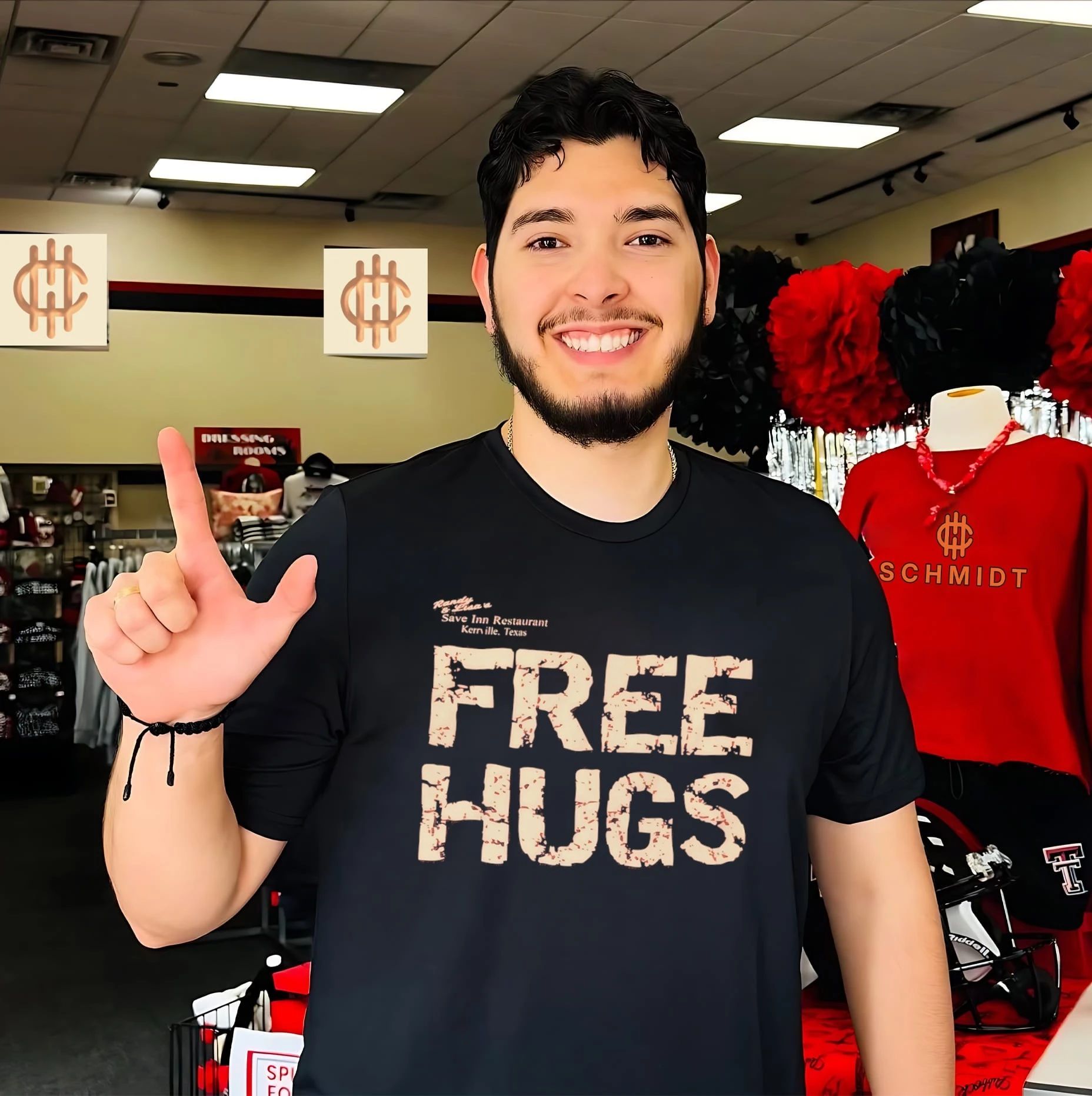 Randy and Lisa Save Inn Restaurant Kerrville Texas free hugs shirt